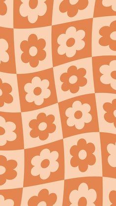 an orange and white checkered pattern with flowers