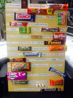 a sign made out of candy bar wrappers