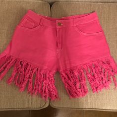 Pink Fringe Shorts That Fit Daisy Duke Style. Cute And Stylish With Front And Back Pockets! #Katchinglooks Summer Cotton Jean Shorts With Fringe, Trendy Fringed Shorts For Summer, Trendy Cotton Fringe Shorts, High Waist Fringe Shorts For Summer, Summer Fringe Shorts, High Waist Cotton Fringe Shorts, High Waist Fringed Cotton Shorts, High-waist Cotton Fringe Shorts, Casual Fringe Bottoms For Spring