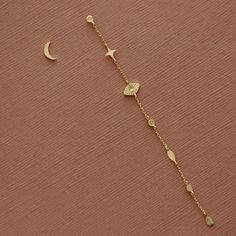 A dainty statement you'll love. Made in sterling silver with 14k gold plating.  Sold in asymmetrical pairs. (1 stud + 1 drop earring) Moon And Star Earrings, Asymmetrical Earrings, Dope Jewelry, Minimal Aesthetic, Moon Star, Drop Earring