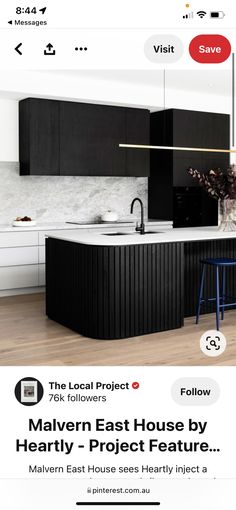 an advertisement for a modern kitchen with black cabinets