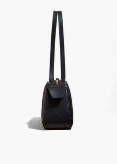 Simona Shoulder Bag in Black Leather – KHAITE LLC Calf Leather, Sale Items, Calf Skin, Black Leather, Sleek, Shoulder Bag, Zipper, Leather, Black