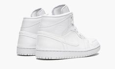 The women’s Air Jordan 1 Mid “Triple White Patent Leather” is a crisp and clean edition of the mid-top Air Jordan 1 for women.  The Jordan 1 Mid receives a glossy all-white patent leather upper with all other details from the tongue to the rubber sole unit in nothing but white.  The embossed "wings" logo and the Jumpman branding on the tongue are tonal to ensure a true “triple white” aesthetic.  The women’s Air Jordan 1 Mid “Triple White Patent Leather” released in 2018. Air Jordan 1 For Women, Jordan 1 For Women, Jordan 1 Mid Triple White, Wmns Air Jordan 1, Vapour Max Nike, Nike Sacai, Womens Air Jordans, Wings Logo, Patent Leather Shoes