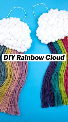 two rainbow colored tassels with the words diy rainbow cloud above them on a blue background