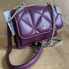 Coach Cj526 Mini Klare Puffy Diamond Quilt Crossbody Deep Berry Handbag Leather Nappa Leather And Smooth Leather Inside Multifunction And Zip Pockets Snap Closure, Fabric Lining Outside Open Pocket Handles Convert To Shoulder Strap With 22" Drop 7" (L) X 5 1/4" (H) X 2" (W Coach Quilted Shoulder Bag For Everyday Use, Trendy Coach Crossbody Bag, Coach Quilted Leather Bag, Coach Crossbody Bag With Chain Strap, Quilted Crossbody Shopping Bag, Coach Bags With Chain Strap For Daily Use, Trendy Coach Bags With Chain Strap, Daily Use Coach Bags With Chain Strap, Daily Coach Bags With Chain Strap