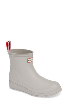 This lightweight version of a classic Hunter rain boot retains all the style and waterproof practicality of the original, in a streamlined, updated silhouette. 1 1/2" heel; 3/4" platform (size 9) 6" shaft Pull-on style Removable insole In hot or humid weather, natural latex rubber releases a protective wax film; simply wipe it off with a damp cloth A pristine finish and shine is easily restored with regular use of Hunter Boot Buffer or Instant Boot Shine Natural rubber upper/textile lining/natur Waterproof Ankle-high Boots For Rainy Weather, Weatherproof Ankle-high Rain Boots, Waterproof Ankle-high Rain Boots, Rain Boots With Rubber Sole For Fall Season, Waterproof Ankle Rain Boots For Spring, Waterproof Ankle Rain Boots For Fall, Casual Waterproof Ankle Rain Boots, Ankle-high Waterproof Boots For Rainy Weather, Ankle-high Rain Boots For Rainy Weather