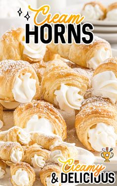 croissants with cream on top and the words cream horns written in white