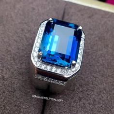 WELCOME TO                GEMSnJEWELRYGALLERY We offer you a broad varity of loose gemstones and exclusive jewellery pieces on best prices. Main Stone: London Blue Topaz, Amethyst Stone Size:9×11mm Stone Shape:Emerlad Cut Accent Stone:cz Material:Solid Silver Finish With Rhodium Customer Satisfaction is our Top Most priority. "Note:Gemstone is Natural not lab Grown. Metal: 925 Silver (Solid 10K/14K/18K White Gold/Yellow Gold/Rose Gold) available to customize,plz feel free to contact us. Ring Siz Gia Certified Blue Topaz Ring As Gift, Gia Certified Blue Topaz Ring In Fine Jewelry Style, Formal Gia Certified Topaz Ring, Gia Certified Fine Blue Topaz Ring, Gia Certified Sapphire Topaz Ring For Anniversary, Blue Tanzanite Topaz Ring For Anniversary, Gia Certified Blue Topaz Diamond Ring Gift, Sapphire Colored Blue Topaz Gemstone Ring, Blue Topaz Sapphire Gemstone Ring