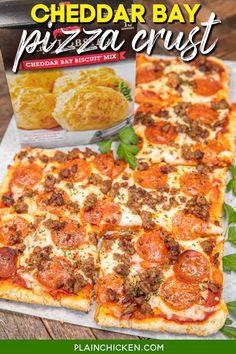 the cheddar bay pizza crust is shown on a cutting board