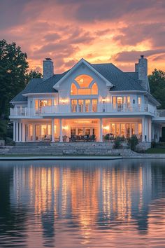 Elegant house with glowing lights by a serene lake. Peek into the extravagant realm of luxury homes with insights on posh designs, exclusive features, and a sprinkle of real estate magic. Dream Beach Houses Luxury, Beach House Luxury, Amazing Rooms, Elegant House, Coastal House, Dream Beach Houses