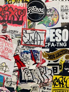 various stickers and decals on a wall