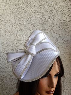 Highest quality white braid hat with rhinestones and veil.  The hat sits on a matching satin headband. Ships immediately expect 4-6 business days Formal Rhinestone Hats For Kentucky Derby, White Rhinestone Hat With Curved Brim, White Hats With Rhinestones And Curved Brim, Elegant White Hat With Structured Crown, Elegant Wedding Hats With Satin Bow, Elegant White Adjustable Top Hat, White Fitted Hat With Pinched Crown, White Rhinestone Party Headpiece, White Fitted Headpiece For Formal Occasions