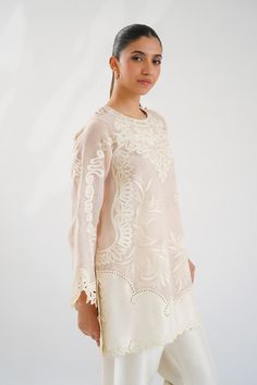 Shyla Elegant Fitted Blouse With Cutwork Hem, Elegant Long Sleeve Cutwork Top, White Long Sleeve Tops With Cutwork Hem, Long Sleeve Cutwork Dresses For Eid, White Cutwork Dress For Eid, Elegant Cutwork Tops For Spring, Long Sleeve Dresses With Cutwork For Eid, Eid Long Sleeve Dress With Cutwork, Elegant Long Sleeve Blouse With Cutwork