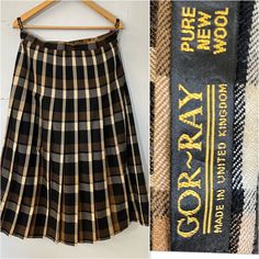 Gorgeous tartan kilt - brown-blk-gray-cream check plaid - fully lined  Concealed zip 8" long  Size label 16 Waist measured flat 16"(32") Length 33"  Condolences is great Kilt Skirt, Tartan Skirt, Tartan Kilt, Skirt Pleated, Size Label, Kilt, Tartan Plaid, Pleated Skirt, Tartan