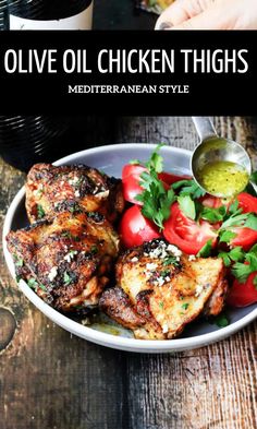 chicken thighs with tomatoes and herbs in a white bowl