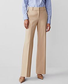 A classic leg-lengthening, slightly flared silhouette. Front zip with double hook-and-bar closure. Belt loops. Front off-seam pockets. Back besom pockets.,Leg Shape:Trouser – a pant with a bit of flare that lengthens legs,Rise:Mid rise: sits 2 1/4" below natural waist,Hit:Fit: Tailored & fitted,Imported:Imported,Fit:Tailored & fitted,Length:Full length: 31 1/2" inseam with 21 1/2" leg opening,Fabrication:74% Polyester, 21% Rayon, 5% Spandex,Garment Care:Machine Washable The Jayne Trouser Pant by Women's Trouser Pants, Women’s Dress Pants, Interview Looks For Women, Closet Rebuild, Office Attire Women Professional Outfits, Women Slacks, Slim Pants Women, Office Attire Women, Tan Trousers