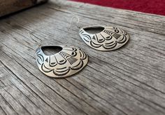 Earrings with a great 70's Southwestern Vibe!Super cool vintage Navajo Style, cast in luxurious white bronze and heavily plated in Sterling Silver. Stamp-work is hand inked, bringing the cool designs out, then finished with a silver brushed finish.2 1/4" in length measuring only the earrings2 1/2" in length including French wiresEarrings come with French wires ~ If you would like them on posts (Nickel Free) just choose POST from the "Select An Option" drop-down menuFree Shipping in the US :-) *C Bohemian Collectible Earrings, Collectible Bohemian Earrings, Artisan Etched Drop Earrings, Bohemian Drop Earrings For Vintage Collection, Nickel-free Vintage Earrings For Festival, Bohemian Vintage Drop Earrings, Vintage Nickel-free Earrings For Festival, Bohemian Etched Teardrop Jewelry, Traditional Silver Etched Earrings