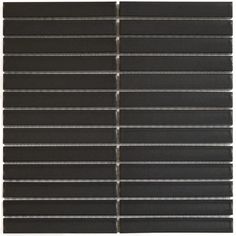 black glass tile with white lines on the bottom and bottom part, in an angled pattern