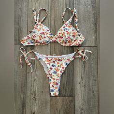 Cute, Floral Bikini Set. Brand New, Never Worn. Top - Medium Bottom - Large Fitted White Summer Swimwear, White Underwire Swimwear For Spring, White Lined Swimwear For Spring, White Fitted Swimwear For Poolside, Fitted White Swimwear For Poolside, Fitted White Swimwear For Beach Season, Spring White Printed Swimwear, Fitted White Swimwear For Beach Party, White Underwire Swimwear For Beachwear