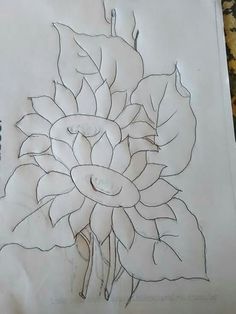 a drawing of a flower with leaves on it's head and the petals are drawn in pencil