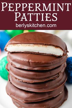 a stack of chocolate peppermint patties on a white plate