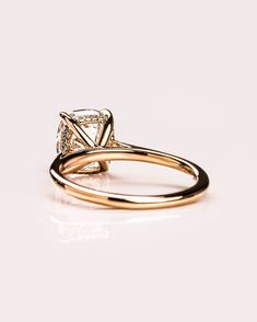 an engagement ring with a princess cut diamond