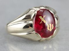 The undercut ruby glass on this vintage ring is bright and crisp, with clean colors in red and gold. The crest depicts the Chi Psi Greek letters and flashes with light when worn, ready to wear or gift to your fraternity brother! Metal: 10K Yellow Gold Gem: Ruby Glass Gem Measurements: 12 x 10 mm, Oval Ring Size: 9.75 Marks: "10K" Stamped on the inside band The Undercut, Gem Ruby, The Chi, Greek Letters, Cameo Ring, Glass Gems, Oval Ring, Oval Rings, July Birthstone