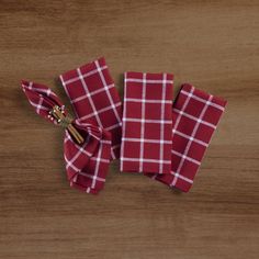 red and white checkered napkins on wooden table