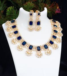 High quality designer gold plated CZ diamond Sapphire blue necklace. Formal Blue Necklace With Elegant Design, Elegant Blue Jewelry Set For Party, Elegant Blue Necklace For Formal Occasions, Blue Elegant Necklace For Formal Occasions, Blue Hand Set Bridal Necklace For Celebration, Blue Hand Set Necklaces For Party, Blue Hand-set Bridal Necklace For Celebration, Blue Gold Plated Jewelry For Party, Blue Bridal Necklace Hand Set For Celebrations