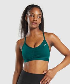 IT’S NOT YOU, IT’S YOUR SPORTS BRA With lightweight, breathable designs, comfortable cups and supportive straps, you can rely on our sports bras to be there for you, and for yours. • Elegant crossover back design• Wear it your way with removable padding and adjustable straps• Shaping scrunch to the front-and-centre SIZE & FIT• Medium support• Body fit• Model is 5'9" and wears a size S MATERIALS & CARE• 78% Polyester, 22% Elastane SKU: B2A7A-TBQR Green Functional Sports Bra With Adjustable Straps, Green Sports Bra With Adjustable Straps, Green Activewear With Adjustable Straps For Sports, Short Bride, Athletic Dresses, Seamless Leggings, Back Design, Sports Bras, Body Fit