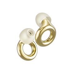 two gold and white earrings on a white background