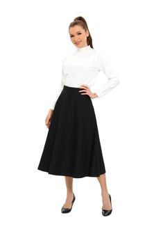 This classic black knee-length skirt is the perfect addition to any wardrobe. Its simple and timeless design makes it versatile and easy to wear for any occasion. The skirt falls at the knee, making it an appropriate and modest length. The A-line cut of the skirt creates a flattering silhouette and comfortable fit. It is made with a lightweight and breathable fabric that will keep you cool and comfortable all day long. It is available in sizes XS to XL, and with a length of 31 inches, it can acc A Line Cut, Black Knees, Fall Skirts, Knee Length Skirt, Keep Your Cool, Modest Outfits, Timeless Classic, Classic Black, The Knee