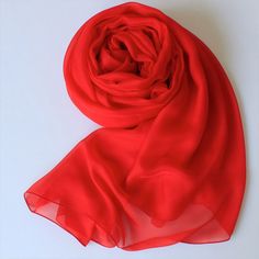 Made from premium mulberry silk chiffon, this scarf is perfect for an autumn/sprint day that is not so chilly. This true red (bright red) coloured silk scarf is bold, outgoing, and energetic choice for any cold day. Available in 4 sizes: 78 by 25 inch (200 by 65 cm) 98 by 25 inch (250 by 65 cm) 78 by 50 inch (200 by 130 cm) 98 by 50 inch (250 by 130 cm) Fabric: 100% Mulberry Silk Chiffon This solid colour series is also available in a lot of other colours. Please check out the Scarf section of my store. Silk Scarves Perfect For Gifts, Elegant Red Scarves For Spring, Classic Red Scarf Gift, Elegant Red Scarf For Formal Occasions, Classic Red Silk Scarves, Classic Red Silk Scarf, Solid Silk Scarf Gift, Red Scarf As A Spring Gift, Red Scarves As Spring Gifts