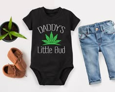 Daddy's Little Bud Baby Outfit, Mommy's Little Bud Baby Outfit, Baby Shower Gift, Newborn Bodysuit, Daddy Kids Shirt, Daddy Toddler Gift HOW TO PLACE YOUR ORDER * Choose your t-shirt color * Choose your size * Choose your design&text color * PLEASE make sure all your order's steps PRODUCT DESCRIPTION  t-shirt feels soft and light, with just the right amount of stretch. It's comfortable and the unisex cut is flattering for both men and women. * Solid colors are 100% combed and ring-spun cotton * Ash color is 99% combed and ring-spun cotton, 1% polyester * Heather colors are 52% combed and ring-spun cotton, 48% polyester * Athletic and Black Heather are 90% combed and ring-spun cotton, 10% polyester * Heather Prism colors are 99% combed and ring-spun cotton, 1% polyester * Fabric weight: 4.2 Baby Boy Must Haves, Baby Onsies Ideas Funny, Newborn Baby Stuff, Fun Baby Announcement, Country Baby Shower, Gothic Baby, Outfit Baby Shower, Goth Baby