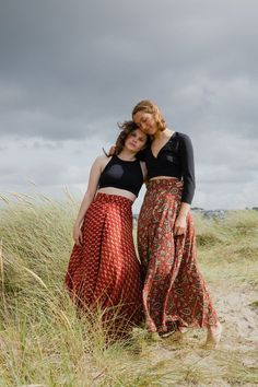 Hand block printed, creating sustainable livelihoods for female artisans. The Maxi Wrap Skirt in Rose is seasonless by design. Made from soft, light cotton the wrap skirt is incredibly comfortable, offering style with flattering movement from the waist. Gathers and ties at the side or back of the waist. Crafted with three waist loopholes for an adjustable, flexible fit. Upper ankle Length. Model is 5'5 tall, size UK 10, US 6 and is wearing the S/M. Hand block printed onto 100% cotton. Plant-base Maxi Wrap Skirt, Mid July, Inspired Illustration, Wrap Clothing, Cotton Plant, Wrap Maxi Skirt, Summer 24, Dress Inspiration, Block Printing