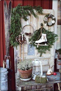 an old door is decorated with christmas decorations