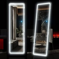 two mirrors with lights on each side of them in front of a couch and table