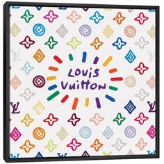 the louis vuitton book with colorful letters and symbols on it's cover