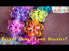 the bracelet is decorated with colorful flowers