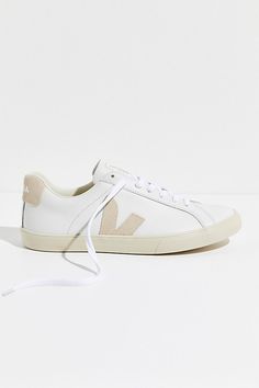 Made with sustainable materials, these retro style leather sneakers are featured in a low-top design with suede details and a tonal logo on the side. * Padded collar and footbed * Lace-up front | Veja Esplar Sneakers at Free People in Tan, Size: EU 36 Everyday Fall Sneakers With Speckled Midsole, Modern Low-top Sneakers For Fall, Everyday Suede Sneakers With Speckled Midsole, Everyday Fall Sneakers With Gum Sole, Fall Everyday Sneakers With Gum Sole, Fall Everyday Sneakers With White Sole, Everyday Suede Sneakers With Gum Sole, Sneakers With Textured Sole For Everyday Fall Use, Everyday Sneakers With Textured Sole For Fall