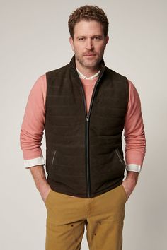 Our sporty and versatile Gavin vest is ready to take on cool-weather days. Made from soft yet durable lamb suede, this quilted leather vest is the perfect pick for fall adventures, from hiking amidst the changing leaves to taking in a Sunday football game. A classic cut with standup collar and full front zip pairs perfectly with your favorite jeans and boots, while four pockets offer space to store your keys and phone. Leather Winter Outdoor Vest, Brown Vest Outerwear For Outdoor Activities, Winter Outdoor Brown Vest, Outdoor Brown Leather Vest, Casual Leather Vest, Casual Leather Vest For Fall, Fall Adventures, Sunday Football, Changing Leaves