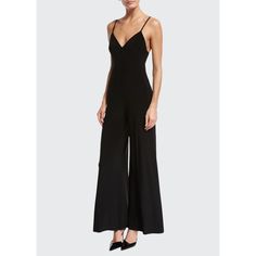 Norma Kamali slip-style jumpsuit in signature luxurious stretch jersey. Deep V neckline; squared back. Spaghetti straps. Fitted bodice. Wide legs fall from hips. Step-in style. Polyester/spandex. Machine wash. Imported. Style Jumpsuit, Jumpsuit Black, Norma Kamali, Designer Swimwear, Wide Legs, Black Jumpsuit, Bergdorf Goodman, Fitted Bodice, Deep V