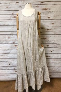 Beautiful long slip dress featuring a ruffle hem and tank sleeves. Made with delicate hankie linen. Slightly transparent and great for layering. Very bohemian and vintage style. Made in the USA. Garment Measurements Generous sizing. Fabric has no stretch. S M L XL Bust 38” 40” 42” 44” Hip 42” 44” 46” 48” Length 50” 50” 50” 50” Summer Linen Maxi Dress With Ruffle Hem, Sleeveless Linen Maxi Dress With Ruffles, Bohemian Linen Dress With Ruffles, Casual Linen Maxi Dress With Ruffles, Bohemian Linen Maxi Dress With Ruffles, Vintage Linen Maxi Dress For Summer, Long Slip Dress, Fairy Skirt, Lagenlook Style