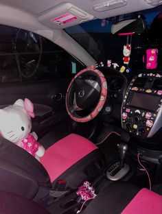 Hello kitty Hello Kitty Car Interior Aesthetic, Hello Kitty Car Inside, Car Theme Ideas Interior, Cars Inside Decorations, Hello Kitty Car Decorations, Car Decorations Interior Y2k, Car Decorations Interior Hello Kitty, Hello Kitty Steering Wheel Cover, Mcbling Car Interior