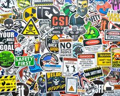 many different stickers are on the wall