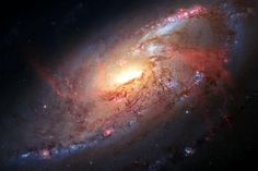 an image of a very large and colorful galaxy in the night sky with many stars