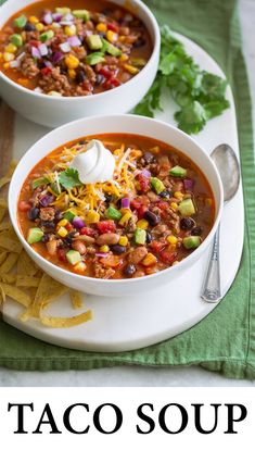 two bowls of taco soup with tortilla chips on the side