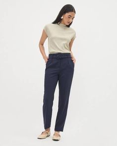 This high-rise pant featuring a paperbag waistband, an elegant tapered leg, a removable belt and made in a sophisticated satin crepe is a definite essential to add to your professional wardrobe. A timeless and comfortable piece that you will wear year after year. 

Fit & Cut
- Tapered ankle leg
- High-rise
- 28" inseam (size 8)

Design Details
- Non-stretch satin crepe
- Paperbag waistband
- Zipper closure with hook and bar
- Removable belt
- Side slash pockets and back welt pockets
- Pleats at leg Slim Fit Dress Shirts, Professional Wardrobe, Fitted Dress Shirts, Slim Fit Dresses, High Rise Pants, Maternity Shops, Linen Shop, Ankle Length Pants, Tailored Shirts