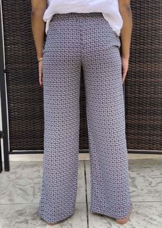 Proudly Made in USA These adorable casual fit pants feature a vintage flower pattern, relaxed fit & elastic waist. These pants are an easy go-to in your closet for daily wear or going out with the ladies. Mid rise waist Vintage Flower Print Side pockets Elastic on waist Relaxed Fit Both models are wearing size Small Style# ISP1235 Super Soft 100% Poly Machine Wash, Line Dry Size Info: Relaxed Fit:Measurements for these Pants:Waist: S 28", L 32"Rise: S 12", L 12"Total Length: S 40", L 41.5"Inseam Casual Straight Leg Pants With Floral Print, Casual Wide Leg Pants With Floral Print, Relaxed Fit, Casual Floral Print Cotton Wide Leg Pants, Casual Straight Leg Floral Print Pants, Casual High-waisted Floral Wide Leg Pants, Casual Floral Print High-waisted Wide Leg Pants, Casual Floral Print Wide Leg Lounge Pants, Casual Floral Print Wide Leg Loungewear Pants, Casual Floral Print Wide Leg Pants For Loungewear