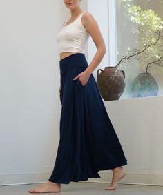 Same construction as our yoga jogger waist., Maxi skirt with pockets., Must have item., Flared bottom , Banded waist.INCHES SMALL MEDIUM LARGELENGTH 39 39 1/2 40 WAIST 25 27 29 Made In: MADE IN USAFabric Contents: 95% Organic Bamboo, 5% SpandexCare Instructions: machine washSize Measurement (inch): S: 25.0 (Waist), null (Hips), null (Length) M: 27.0 (Waist), null (Hips), null (Length) L: 29.0 (Waist), null (Hips), null (Length) Maxi Skirt With Pockets, Kimono Wrap, Skirt With Pockets, Skirts With Pockets, Tie Dyed, Sustainable Fashion, Fabric Care, Jumpsuit Dress, Sunnies